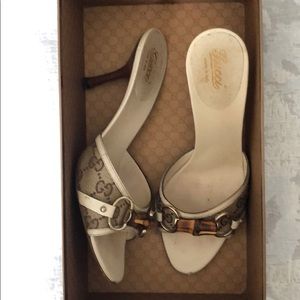 Gucci Kitten bamboo heel slides.